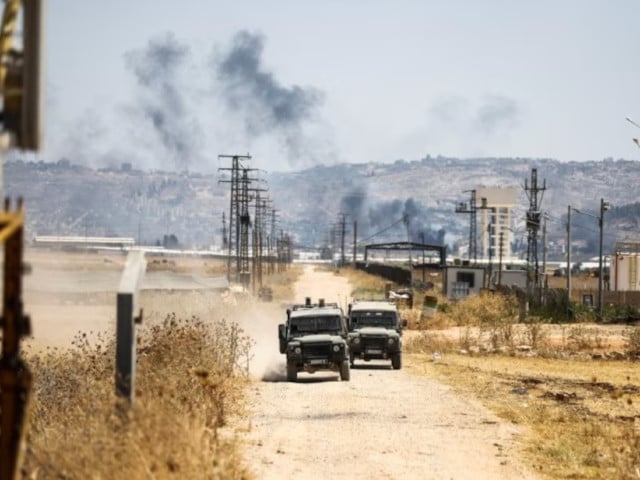 israeli military jeeps drive on a road in the israeli occupied west bank july 3 2023 photo reuters